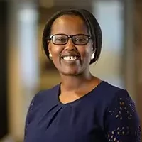 Profile image of Zintle Mokgapa smiling in a corporate office